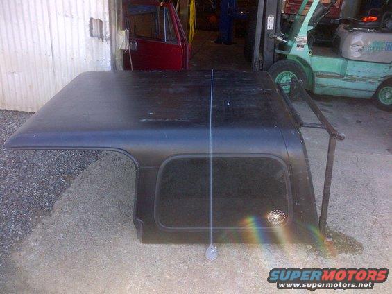 Black Jeep CJ hardtop with side window