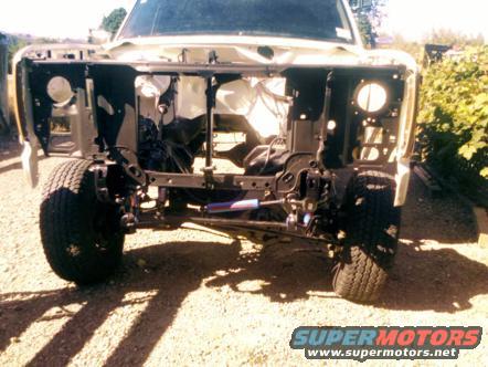 1982 Ford Bronco front end with engine removed, showing chassis and suspension components