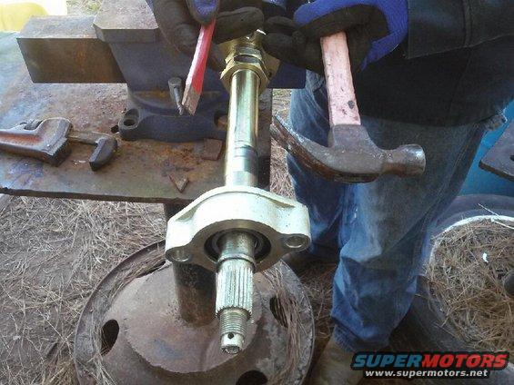then with these tools tap the inner ring of the bearing and it will slide off 