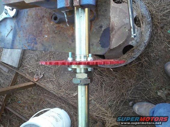 take the old spocket off and put the new one on and make sure to use extra long bolts so you can put lock nuts on the other side and then reassemble 