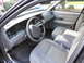 2007 Ford Crown Victoria - Interior view of a 2007 Ford Crown Victoria, highlighting the dashboard and seating area.
