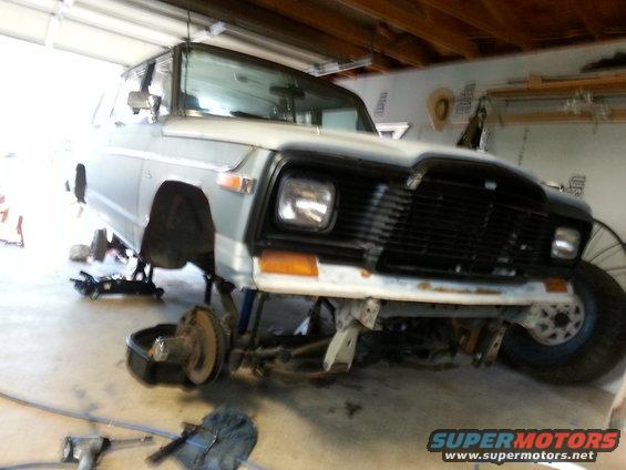 1982 Jeep Wagoneer front end on jack stands, wheels removed