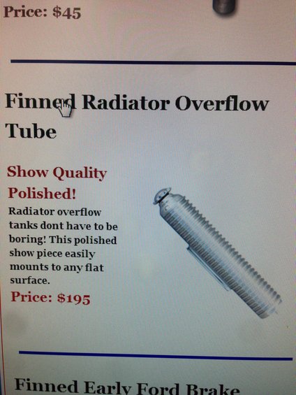 Finned radiator overflow tube, polished metal, ribbed body, angled view