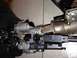 2009 Ford Crown Victoria - Close-up of a vehicle's steering column ignition assembly, including the key cylinder and wiring harness, with a Supermotors.net watermark…