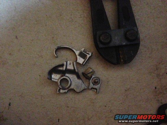removed police column shift bracket, very difficult to remove! needs to be cut and carefully removed.