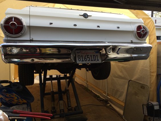 White 1964 Ford Ranchero rear end with California license plate 81651D1