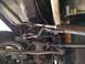 1964 Ford Ranchero - Underside view of the power steering system, showing the cylinder and linkage components.