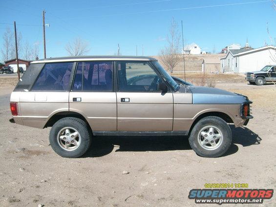 Tan and blue 1991 Land Rover Range Rover side view