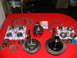 1978 Ford Bronco - Various automotive differential components are displayed on a red cloth, ready for installation or repair.