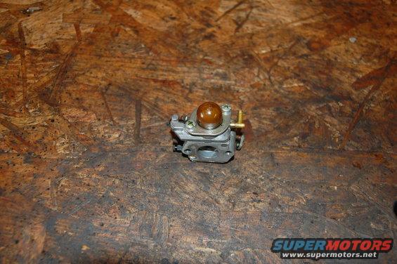 Carburetor with a clear fuel primer bulb