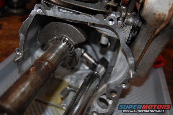 Close-up of internal engine components with gears and shafts