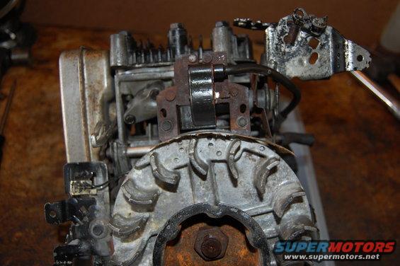 Engine part with a rusty flywheel and ignition coil