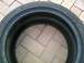1993 Ford Probe - Close-up of a Continental SportContact 2 tire, size 255/40 R 17, on a brick surface.