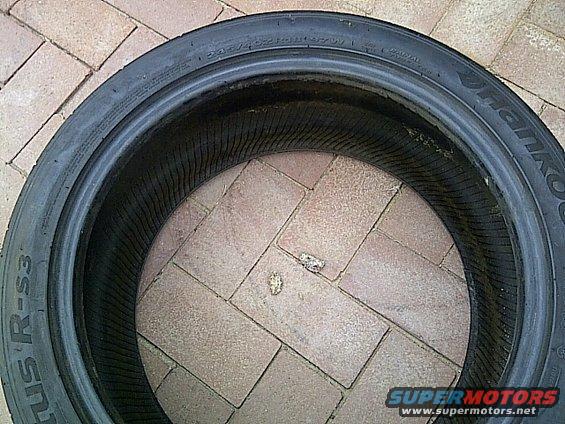 tire with Hankook Ventus R-S3 branding on brick patio