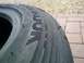 1993 Ford Probe - This is a close-up view of a tire with visible wear and tear on the tread.