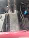 1993 Ford Bronco - Close-up view of the engine's air intake assembly, dual ribbed hoses and associated wiring.