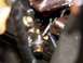 1993 Ford Crown Victoria - A close-up view of engine components, marked with red arrows, shows a dark, greasy area.