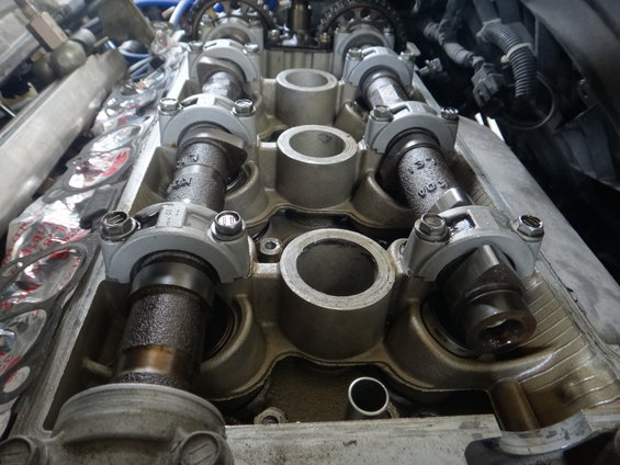 Close-up of engine camshafts and valve train components