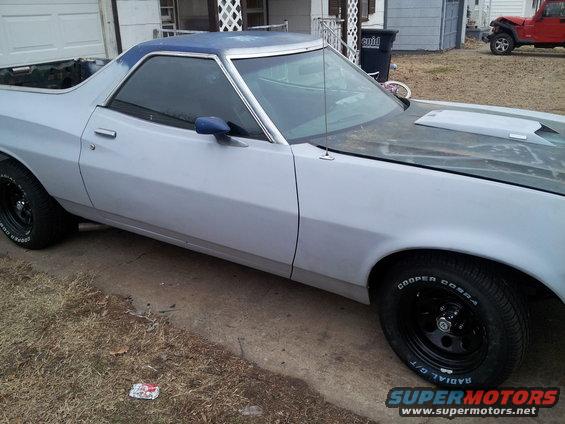 1973 Ford Ranchero, light blue roof, primer gray body, black wheels, hood scoop
