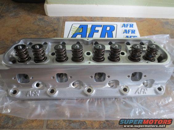AFR cylinder head with springs, logo visible