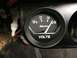 1964 Ford Ranchero - This is a close-up of a voltmeter gauge, not a 1964 Ford Ranchero.