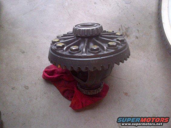 Differential carrier with bearings sitting on a red cloth