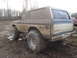 1978 Ford Bronco - This 1978 Ford Bronco is heavily covered in mud, suggesting it has been used for off-roading.