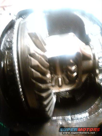 Close-up of differential gears inside a housing
