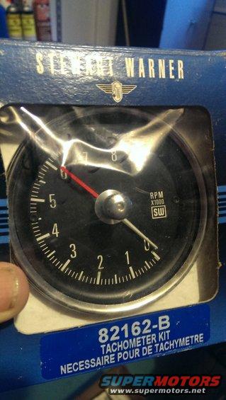 Stewart Warner tachometer gauge with RPM x1000 markings