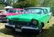 1964 Mercury Monterey - Front view of a green 1957 Mercury Monterey at an outdoor car show.
