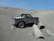 1980 Ford Bronco - This 1980 Ford Bronco is shown navigating a challenging off-road course with concrete pipes.