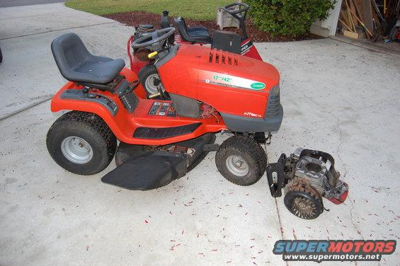 Orange riding mower with detached engine and "17"-42"" label