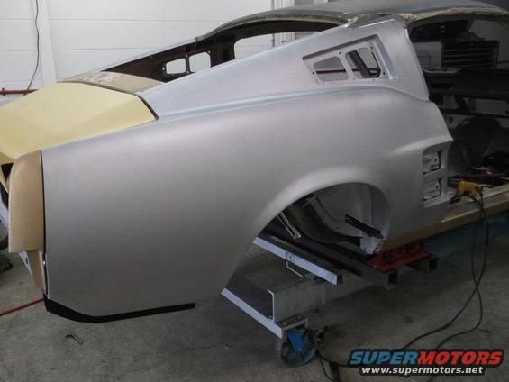 1967 Ford Mustang rear quarter panel and trunk area in primer