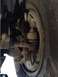 1995 Ford Bronco - This image shows a close-up view of a vehicle's suspension system, specifically the tie rod end and ball joint.