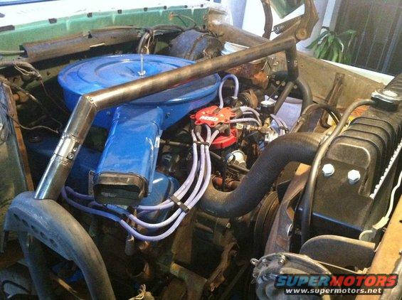 Engine bay with blue air cleaner and red MSD distributor
