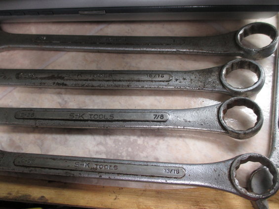 Four S-K TOOLS wrenches with sizes 16/16, 7/8, and 13/16 visible