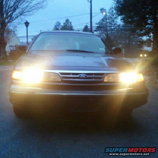 1997 Ford Crown Victoria front view with headlights on