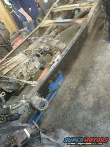 Truck frame with transmission and drivetrain components visible