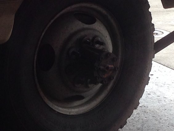 Close-up of a truck wheel hub and tire