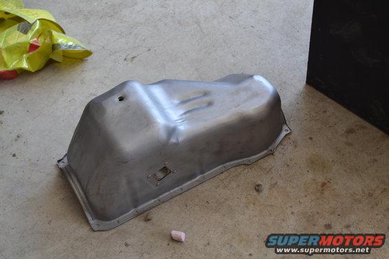 Oil pan on concrete floor