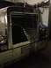 2003 Peterbilt 379 - Front view of a 2003 Peterbilt 379 truck, highlighting its chrome grille and bumper.