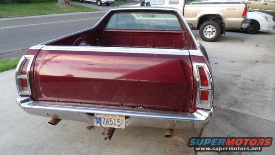 Maroon 1972 Ford Ranchero rear view, chrome bumper, dual exhaust, California license plate 76515