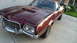 1972 Ford Ranchero - This 1972 Ford Ranchero features a distinctive grille and dual hood scoops, presented in a three-quarter front view.