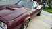 1972 Ford Ranchero - This 1972 Ford Ranchero features a distinctive hood with dual scoops, visible from a three-quarter front perspective.