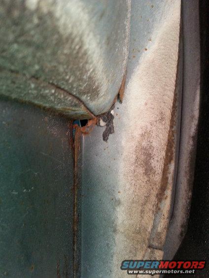 20140315_153903.jpg shot of the same hole from the wheel well side.