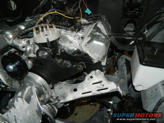 Engine bay with distributor cap and wires visible
