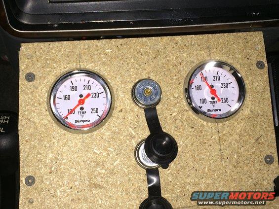 Custom dashboard with two Sunpro gauges and a shifter boot