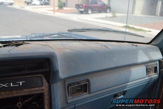 Cracked dashboard interior of a 1981 Ford F-250 XLT