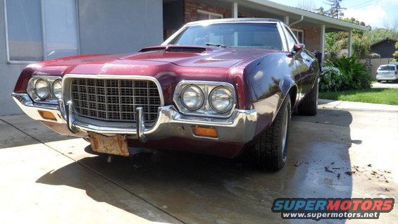 Maroon 1972 Ford Ranchero front 3/4 view with prominent grille and dual headlights