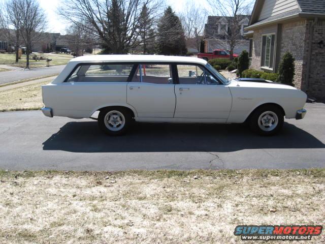 White 1966 Ford Falcon station wagon, side view